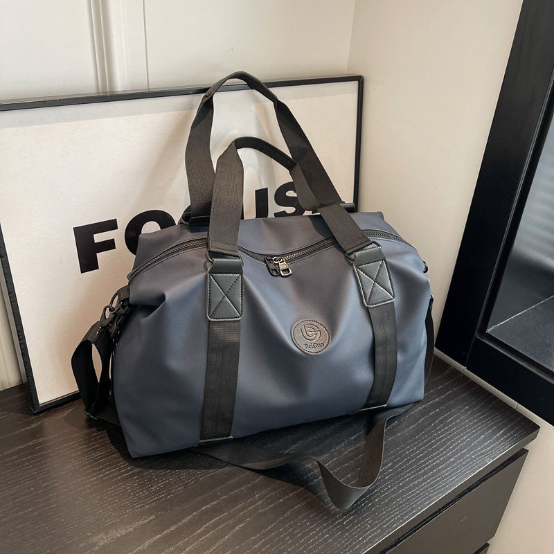 New travel bag women's travel portable hand luggage bag Korean version large-capacity messenger sports fitness bag travel bag