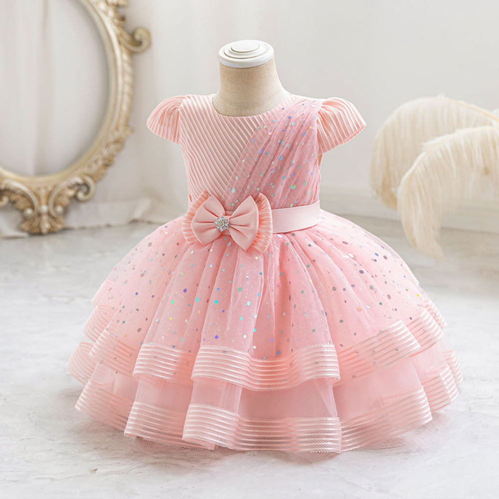 Ready-to-ship wholesale sequin bow princess dresses for girls, perfect for baby's first birthday or special occasions