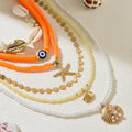 Pearl necklace wholesale european and american cross-border autumn and winter accessories women's niche colorful shell soft pottery multi-layer sweater clavicle chain