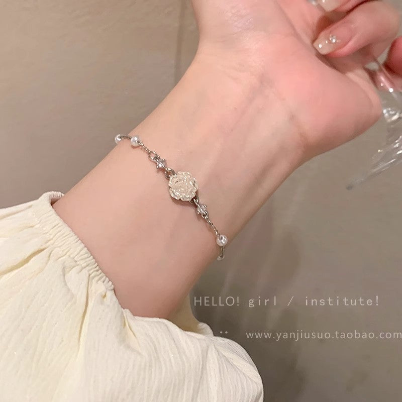 Korean style pearl camellia flower bracelet - women's lightweight luxury, niche, exquisite, high-end, versatile jewelry - wholesale trendy accessories