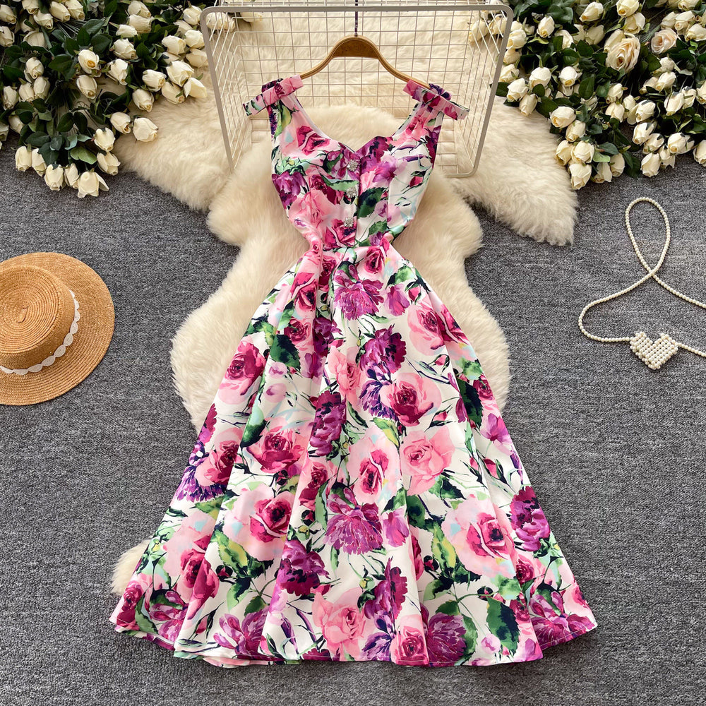 High-end floral print sleeveless dress for women, perfect for summer. elegant, high-waisted, and figure-flattering a-line silhouette, ideal for a sophisticated vacation look