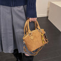 minimalist premium embossed handbag for women, 2025 new arrival, unique design, commute & casual crossbody bucket bag