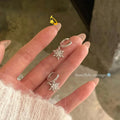 Exquisite sparkling zircon rotating snowflake tassel earrings - women's high-end, elegant, unique, and stunning earrings