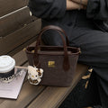 Simple and stylish crossbody bucket bag, 2025 autumn/winter vintage-inspired commuter casual bag, understated luxury niche handbag, shoulder bag
