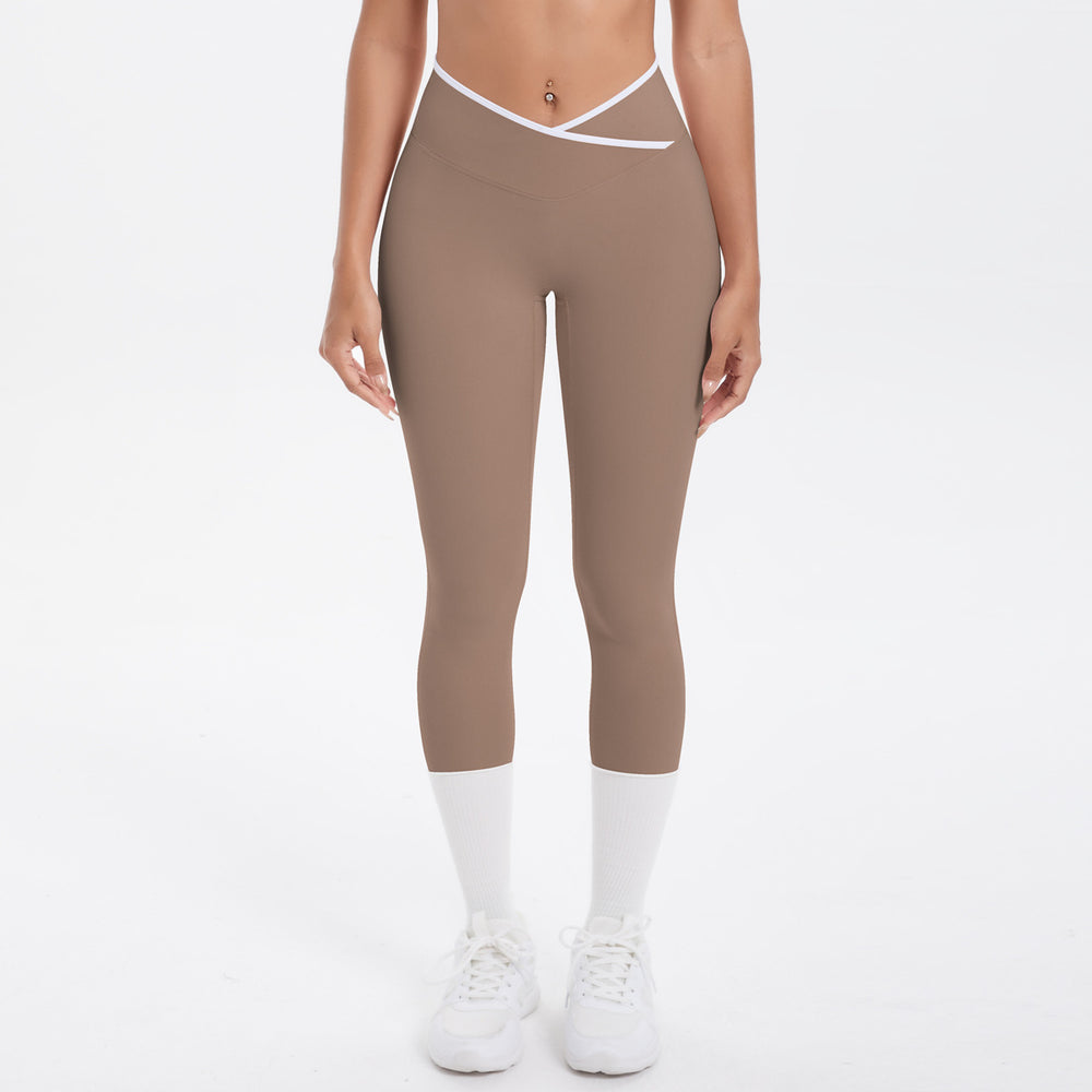 Naked-feel, figure-hugging, high-waisted yoga pants with a contrasting color block design. perfect for outdoor leisure, running, and quick-drying fitness workouts