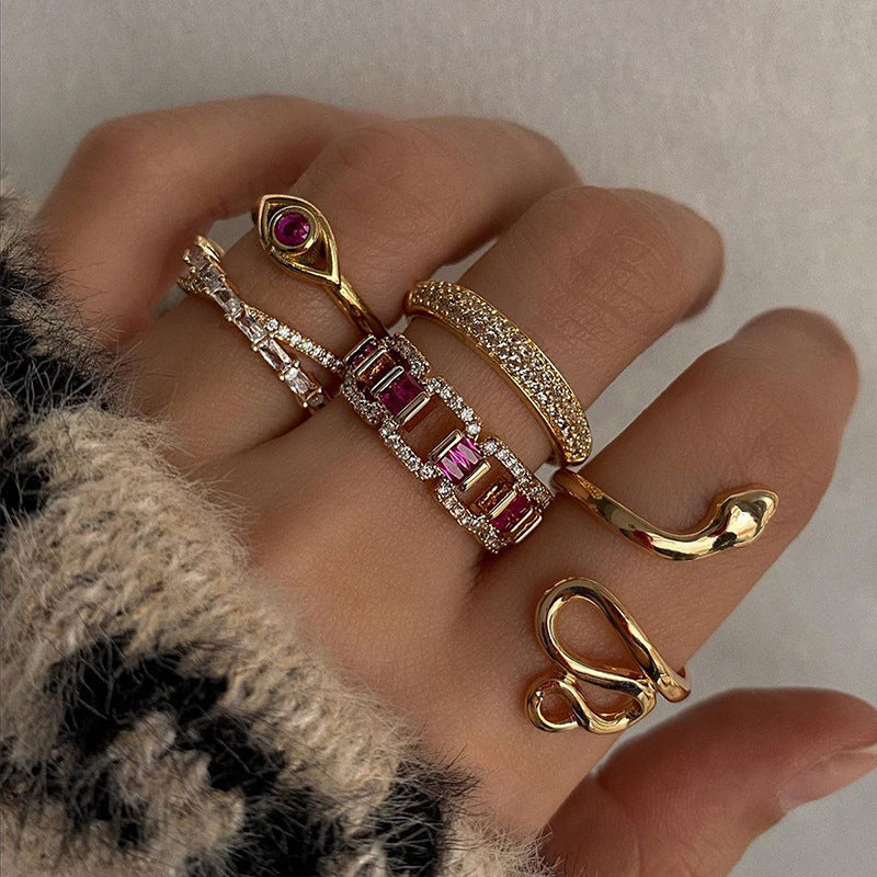 Wholesale alloy rings: european & american cross-border, niche, high-end jewelry - diamond-accented snake ring set, stackable women's accessories