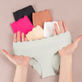 wholesale low-waist breathable sexy women's seamless underwear stylish wavy edge ice silk thin invisible briefs