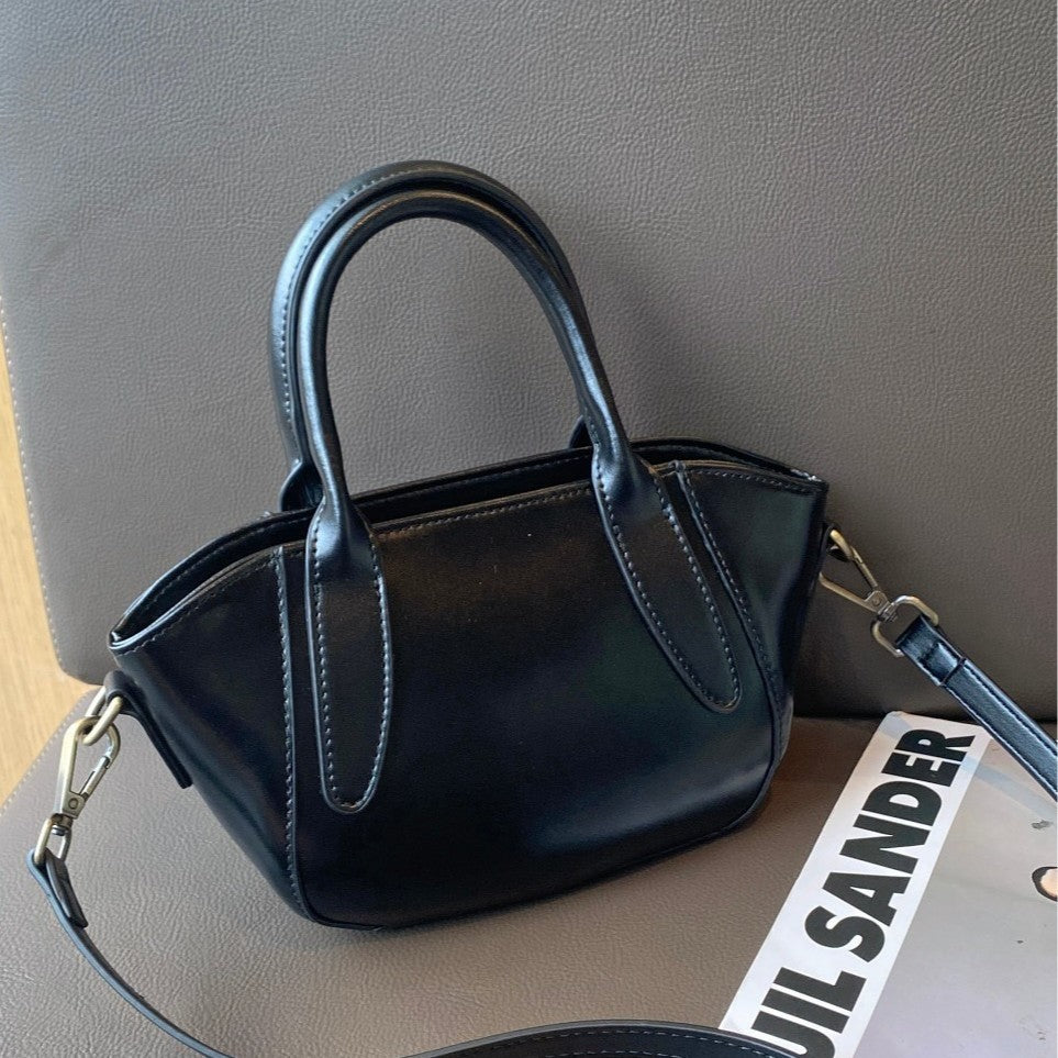 Classy first-layer oil-waxed cowhide shoulder cross-body dumpling bag wing bag texture satchelwork clothing bag genuine leather women's bag
