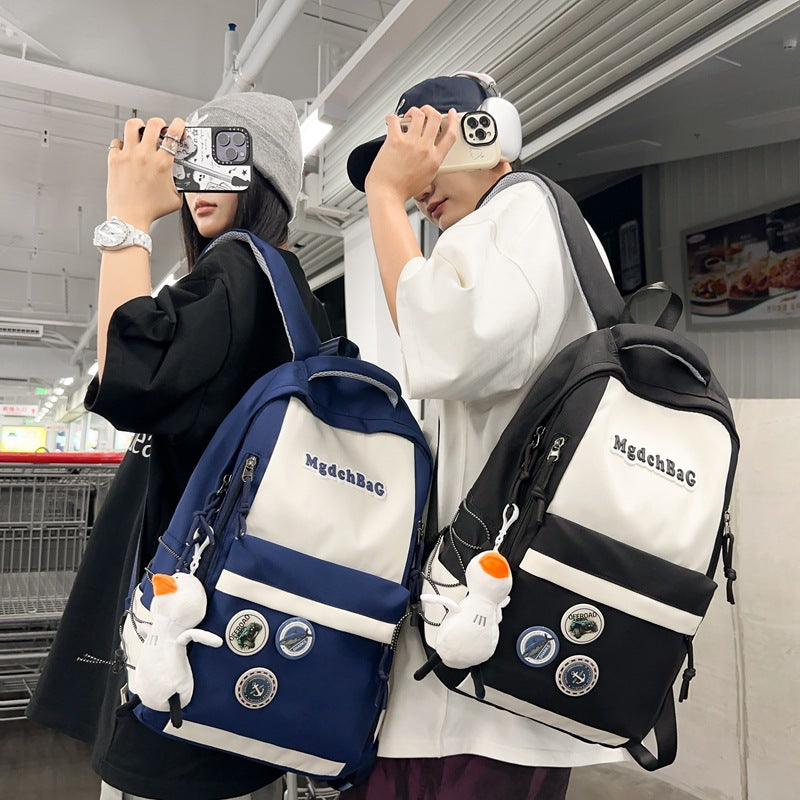 Large capacity casual backpack schoolbag male and female high school junior high school student schoolbag primary school student college student wholesale