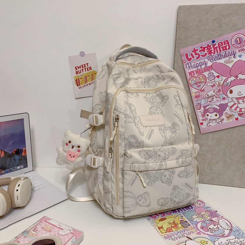 New high school and junior high school students large-capacity night reflective backpack travel backpack Japanese simple graffiti bear