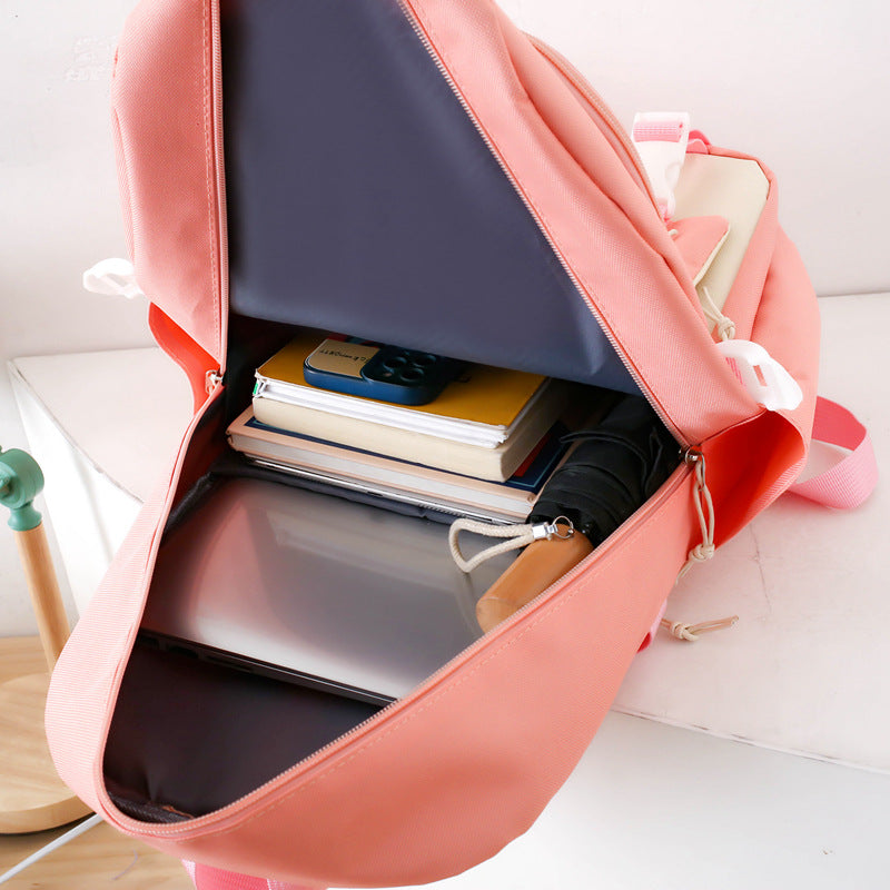 Simple four-piece schoolbag, female primary school backpack,  large-capacity junior high school backpack, high-value lightweight backpack