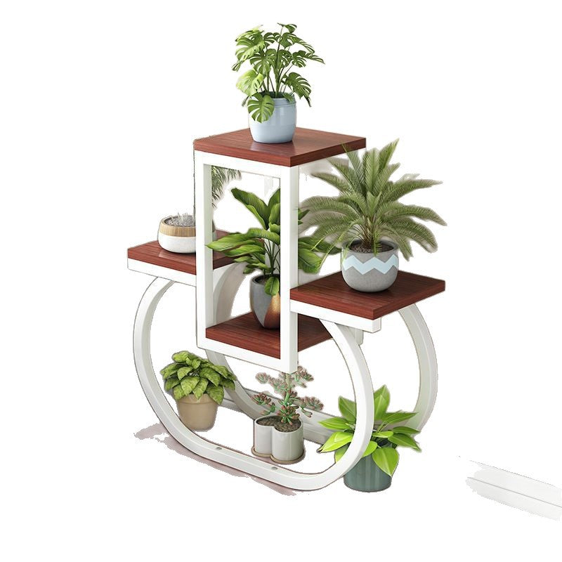 Creative iron art flower stand - freestanding, multi-tiered plant stand for balconies, living rooms, and home use - wall-mounted planter shelf