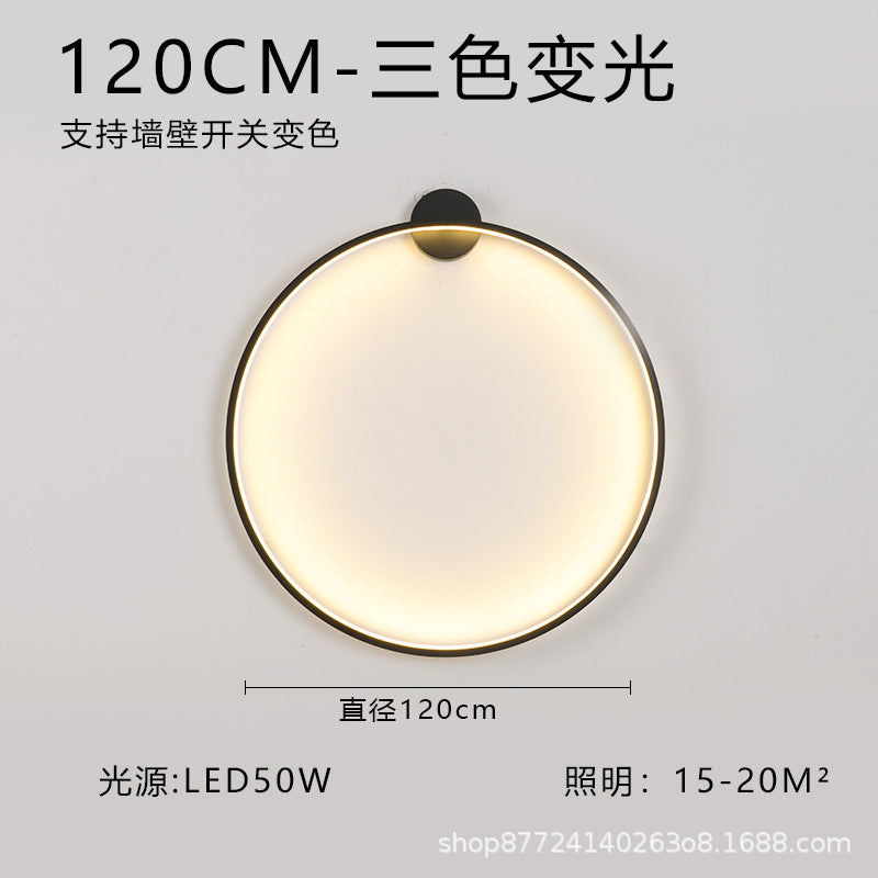 Minimalist chic large round wall sconce - stylish ambient lighting for living room backdrops, bedroom headboards, and more