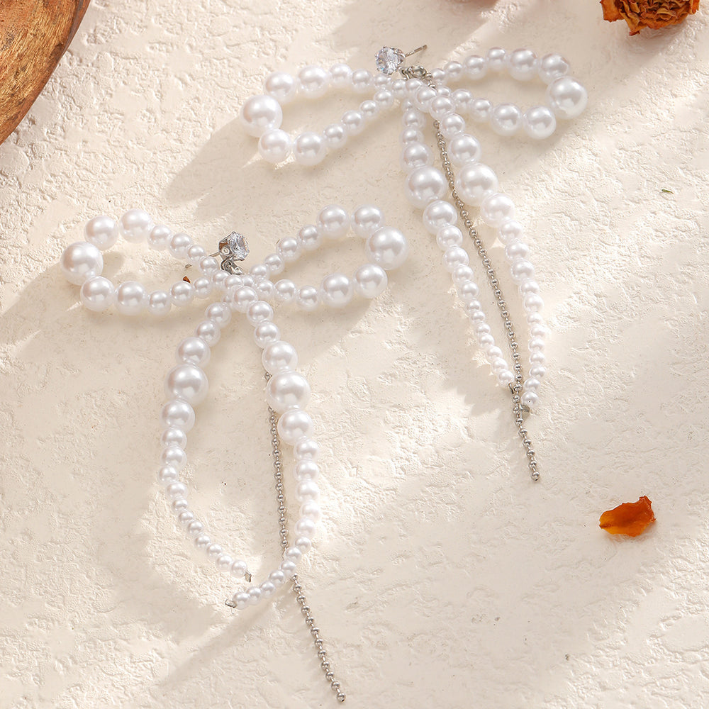 European and american cross-border retro trend imitation pearl earrings - unique irregular bow chain tassel beaded stud earrings for women