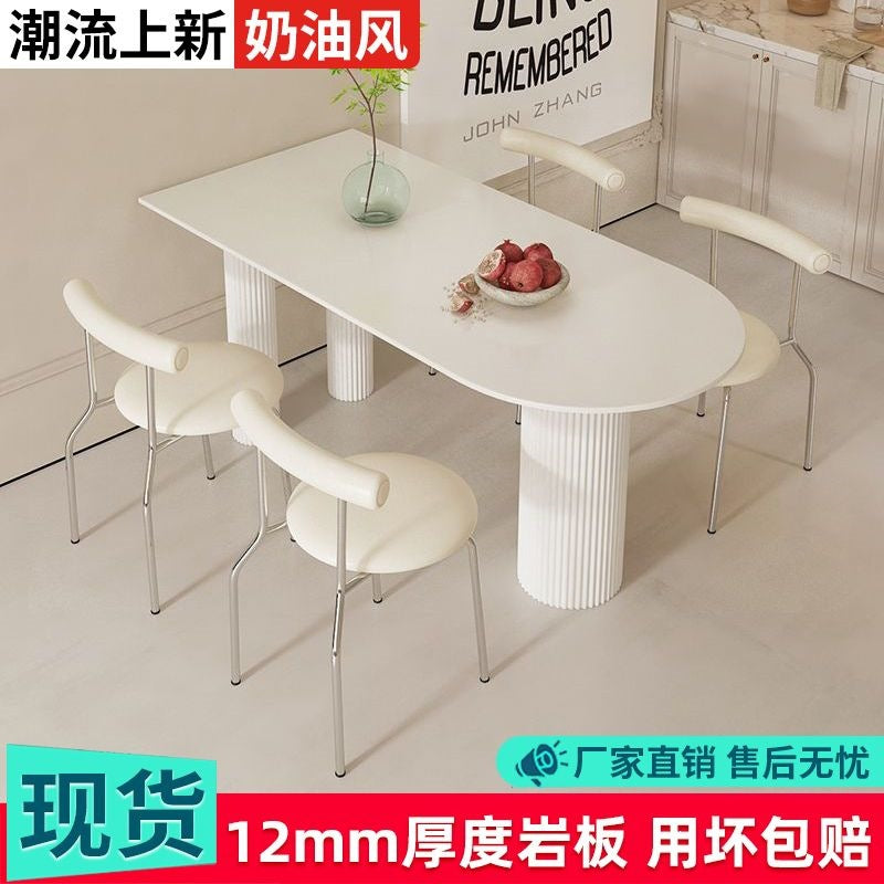 Creamy white rock slab dining table and chair set - modern minimalist semi-circular dining table for small spaces