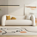 Accessible luxury curved sense of design lazy sofa beauty salon reception rest area bedroom living room fabric leather sofa
