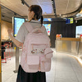 Japanese-inspired, minimalist, and trendy backpack for women. features a delicate floral design, perfect for casual use, school, or class. a versatile, large-capacity backpack that's easy to match with any outfit