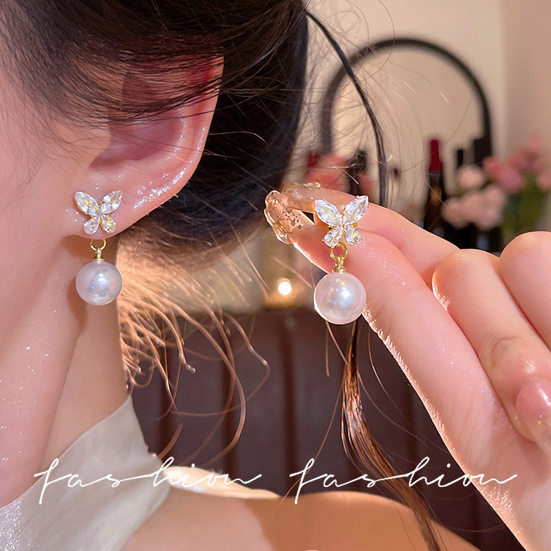 Sparkling butterfly pearl front and back two-wear stud earrings for women 2026 new arrivalniche stylesense of design earringselegant earrings