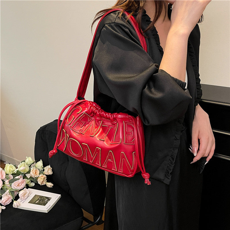 Thailand gentle woman drawstring bag women's 2026 new embossed letter shoulder bag trendy tote bag