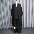 African-inspired loose fit batwing sleeve top and color block striped wide leg pants two-piece set