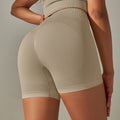 fashion seamless knitting peach hip lifting and abdominal high waistpure color yoga pants sports running fitness three-quarter pants