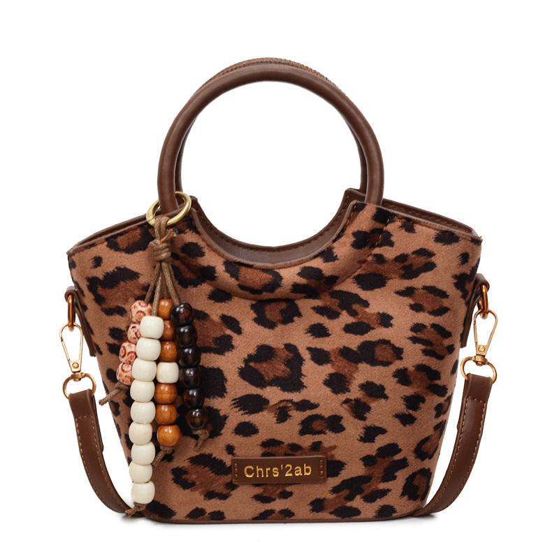 Super hot retro fashion bucket bag 2025 autumn niche design leopard print elegant handbag trendy versatile shoulder bag