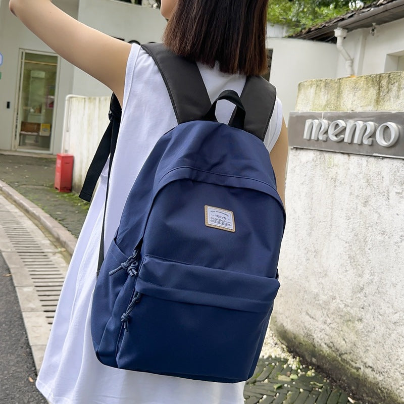 New fashion simple trend backpack large capacity lightweight travel backpack Korean version of junior high school student schoolbag