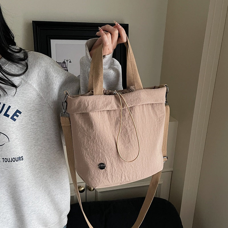 Casual bag women's 2025 new nylon drawstring bundle shoulder bag fitness yoga messenger bag commuter tote bag