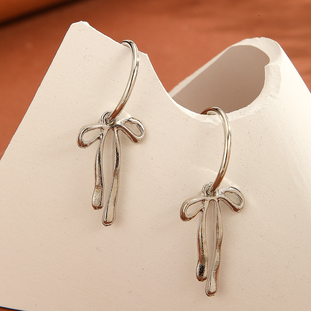 Wholesale bow earrings: european & american cross-border fashion, elegant dangle earrings, minimalist niche design, gold-tone high-end stud earrings