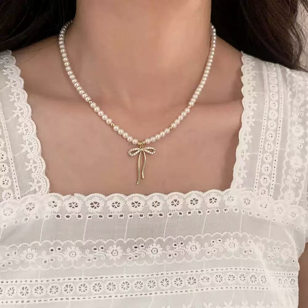 Shijia pearl necklace women's niche styleaccessible luxury design classy fashionelegant clavicle chain necklace sweater chain bead chain
