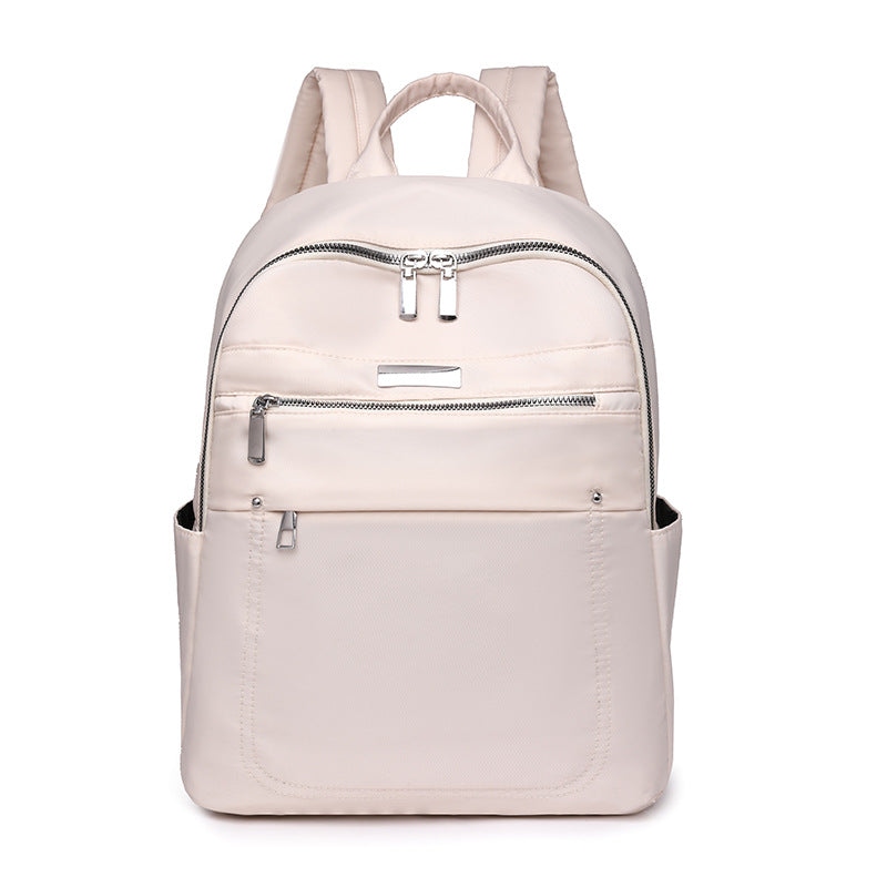 Solid color fashion casual versatile backpack simple trend lightweight business women's computer bag wholesale student schoolbag