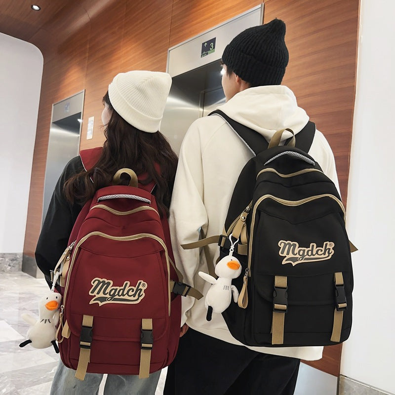 School bag for female college students, Korean version for junior high school students, high school, large-capacity burden reduction backpack for men's middle school students, casual backpack.