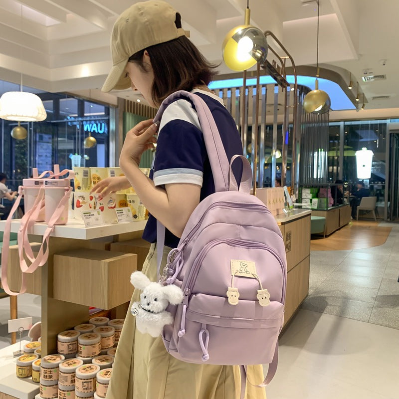 School bag female college student Korean version ins solid color simple and versatile junior high school student travel small backpack high school student backpack