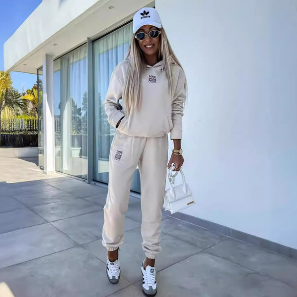 's new casual sweater set European and American long-sleeved hooded solid color top pocket sports trousers two-piece set