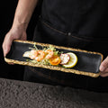 High-end ceramic japanese-style long sushi plate, perfect for showcasing dishes in stylish restaurants and hotels. a visually appealing, elongated serving platter