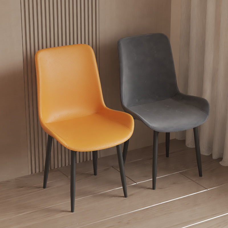 Minimalist luxury leather dining chair - suitable for home, hotel, and reception use. features a durable carbon steel frame and comfortable design