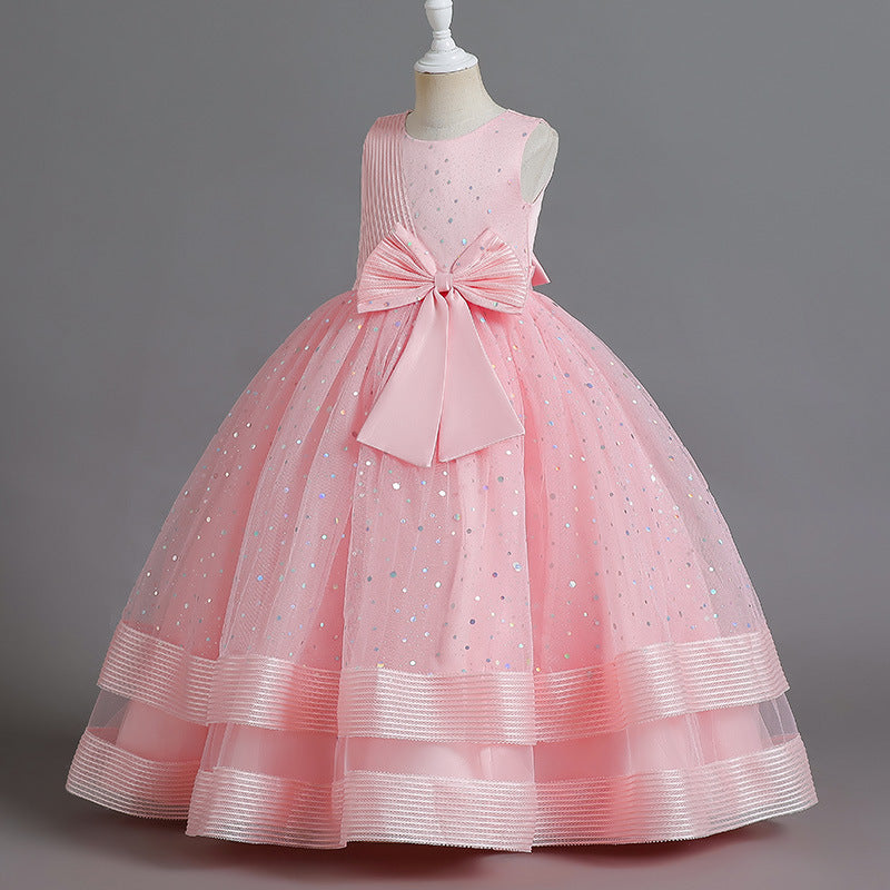 Ready-to-ship wholesale children's polka dot formal dresses, featuring large bow princess skirts for girls, high-end flower girl dresses, and kids' dresses