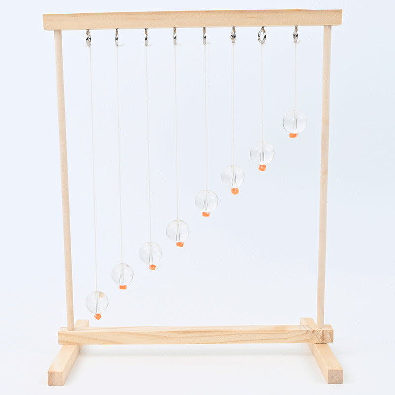 Serpentine pendulum law of conservation of energy handmade DIY technology small production students invent STEAM teaching aids classroom experiment