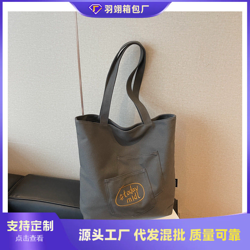 Cross-border canvas bag women's large-capacity 2025 new summer versatile simple shoulder bag casual college student tote bag
