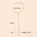 European and american new arrival versatile jewelry: minimalist white pearl bracelet, women's butterfly finger chain bracelet - wholesale from manufacturer