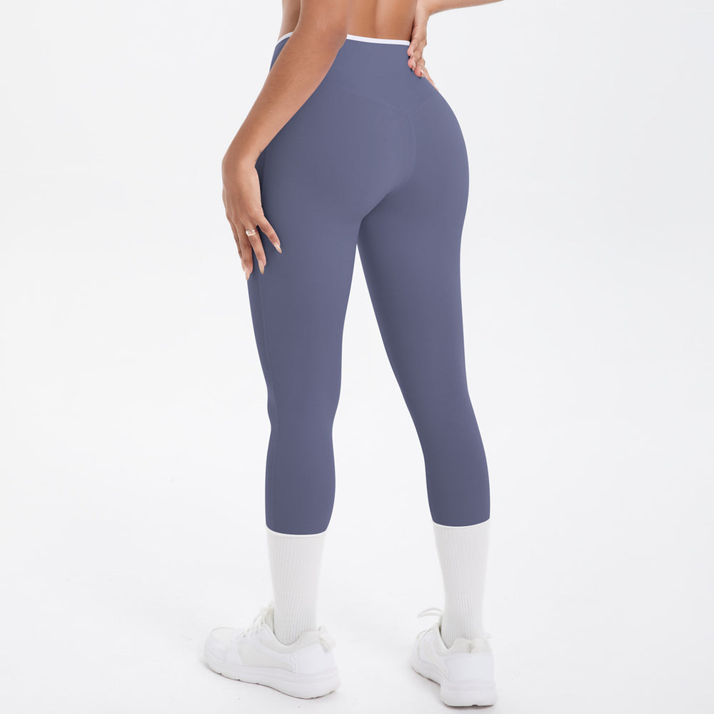 Naked-feel, figure-hugging, high-waisted yoga pants with a contrasting color block design. perfect for outdoor leisure, running, and quick-drying fitness workouts