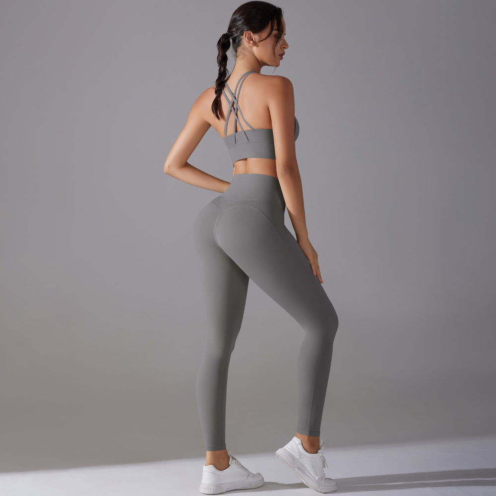 European and american nude feel tight yoga suit cross back quick-drying sportswear high waist hip lifting running fitness suit