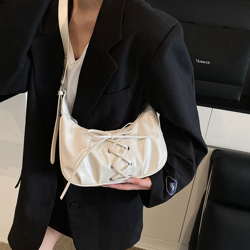 Cross-border fashion niche straps dumpling bag women's 2025 new popular versatile single shoulder messenger bag commuter armpit bag