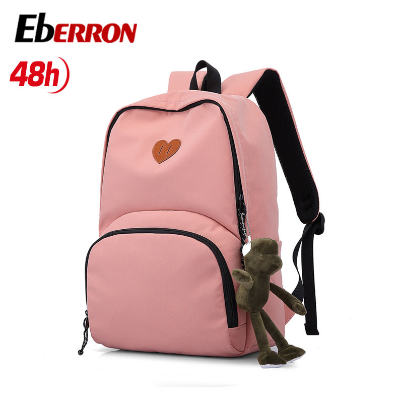 New simple and versatile schoolbag, high-value dirt-resistant belt, doll large-capacity backpack, male and female middle school student backpack.