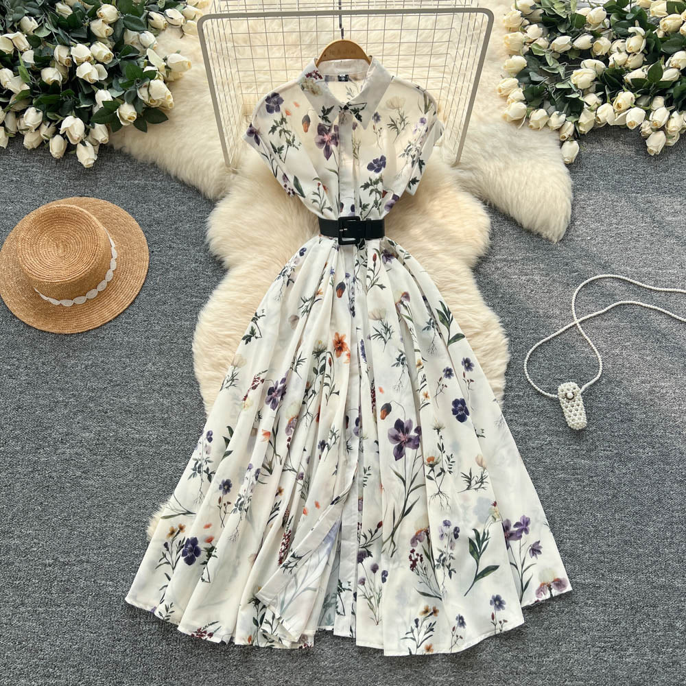 French chic, sophisticated, and unique: tie-waist, short-sleeve, single-breasted, fashionable printed pleated shirt dress with a touch of class