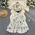 French chic, sophisticated, and unique: tie-waist, short-sleeve, single-breasted, fashionable printed pleated shirt dress with a touch of class