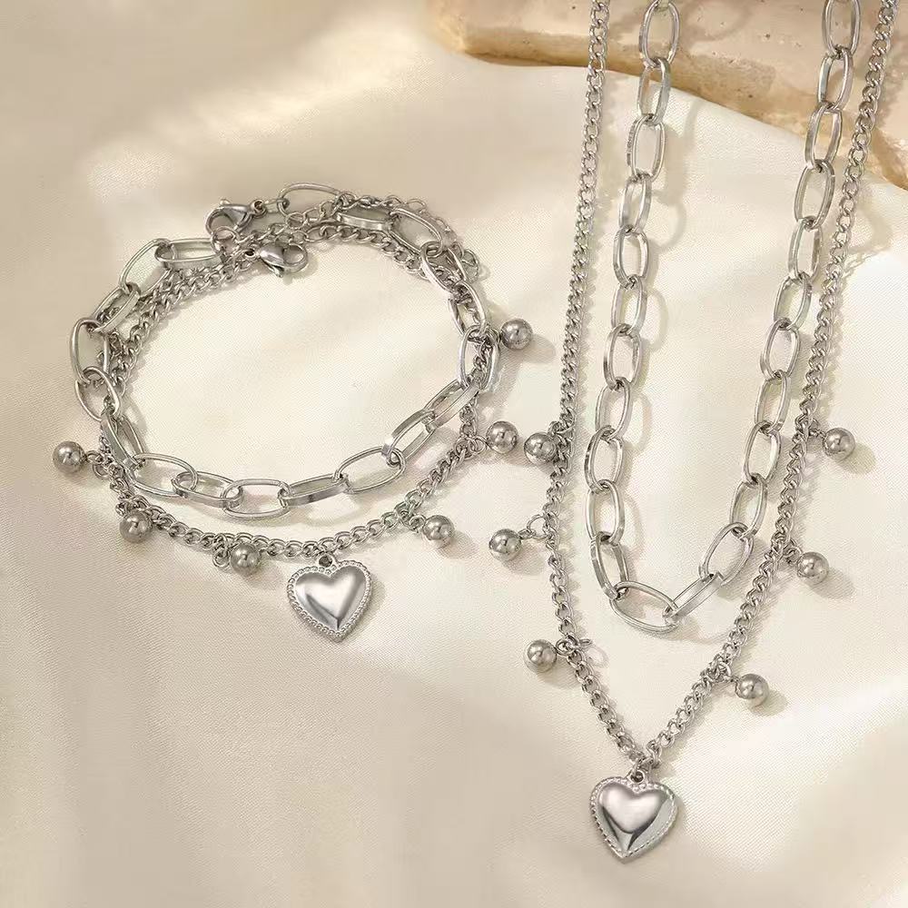 Stainless steel european and american style heart bead double layer necklace and bracelet set - premium women's jewelry