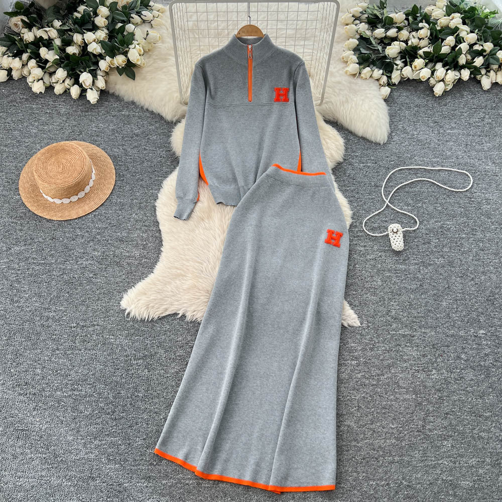 Minimalist color block striped knit power suit: stand collar long sleeve sweater + high waist slim fit long skirt - winter collection