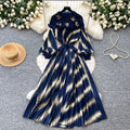Heavy-duty beaded and gold-stamped lantern sleeve a-line dress for women, perfect for spring. features a cinched waist for a slimming effect, elegant and subtly luxurious design, and a full, flowing skirt