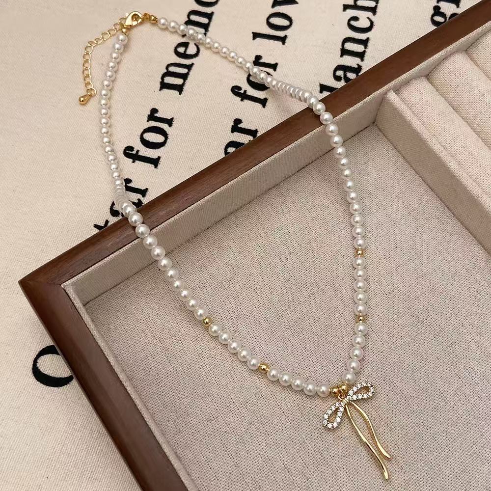 Shijia pearl necklace women's niche styleaccessible luxury design classy fashionelegant clavicle chain necklace sweater chain bead chain